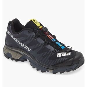 Never worn- Salomon Men's Black and Blue Athletic Shoes